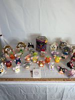 Full lot overview on white backdrop showing large and mini Furbies
