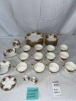 Overview of complete china set arranged on white background