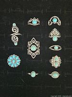 Photo showing the full lot of 10 Southwest style rings arranged in black display with various turquoise stones.