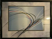 Full view of the framed watercolor painting displaying abstract curved lines in various colors on a blue background.