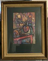 Framed abstract still life painting depicting flowers in a vase, shown in full with gold frame and dark matting.