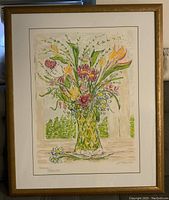 Framed lithograph of a colorful flower arrangement in a patterned vase, signed by Beverly Hyman.