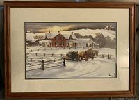 Framed signed print titled by Walter Campbell showing a winter farm scene with horses pulling a sled in snow.