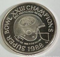 Obverse side of the coin showing San Francisco 49ers helmet and Super Bowl XXIII Champions 1988 inscription.