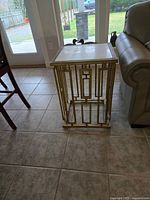 Full view of the chicklet end table showing square shape, marble top, and geometric metal base.