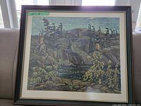 Framed print showing a rocky landscape with trees and water, labeled size 30 x 26 inches.