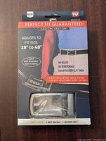 Front packaging showing belt area, highlights fit size 28 to 48 inches, no holes, no stretching, adjusts every 1/4 inch