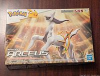 Front of the unopened Pokemon Arceus model kit box with artwork and branding.