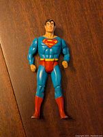 Front view of the Superman action figure showing detailed costume, muscles, and emblem.