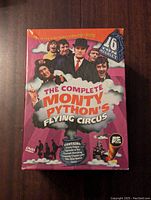 Front cover of the DVD box set showing title and cast images.