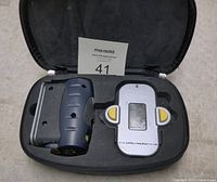 Open carrying case showing the Mastercraft laser level and magnetic base