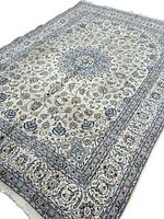 Full view of rug angled to show overall design and size