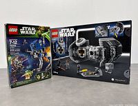 Two LEGO Star Wars boxes displayed side by side showing front packaging for set 75002 and 75347