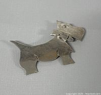 Silver Scottish Terrier dog brooch front view showing shape and design detail