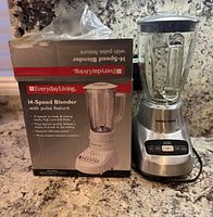 Photo showing Black & Decker blender next to its original Everyday Living branded box displaying key features like 14-speed with pulse.