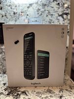 Sealed retail box showing front packaging with product image and Logitech branding