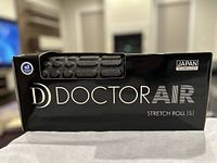 Photo of the DoctorAir black box with brand, product line Stretch Roll S, and Japan Technology markings.
