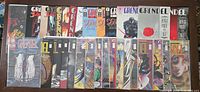 Top view of 28 assorted Grendel comic books laid out showing a variety of covers.