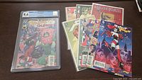 Lot of Harley Quinn comics including CGC graded Harley Quinn #3 and other issues.