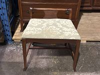 Front, side and alternate angle photos of the antique vanity chair bench showing upholstery details and overall condition.