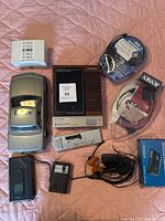 Overview of all items included in the lot grouped on fabric surface