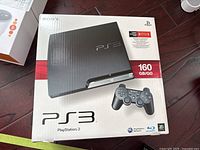 Original retail box showing PS3 Slim 160GB model branding