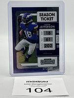 Front of the 2021 Panini Contenders Justin Jefferson Season Ticket football trading card, showing the player running with the ball in Vikings uniform, numbered 071/199.