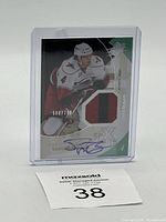 Jamie McBain rookie patch autograph card front showing on-card signature, patch piece, and card number 580/799.