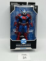 Front view of the Superman Unchained Armor action figure in retail packaging showing 22 points of articulation and DC Multiverse branding.