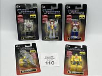 Front view of all five mini figures in original blister packaging showing brand, age recommendation, and limited edition sticker.