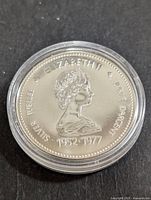 Obverse of the coin showing Queen Elizabeth II profile with Silver Jubilee inscription and years 1952-1977