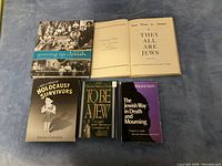 Five Jewish-themed books displayed, including 'Growing Up Jewish,' 'They All Are Jews,' 'It's a Child of Holocaust Survivors,' 'To Be a Jew,' and 'The Jewish Way in Death and Mourning.'