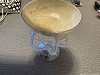 Polish hand-blown art glass vase showing the full side view with unique sculptural glass supports and translucent marbled bowl.