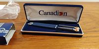 Blue Canadian Airlines ballpoint pen and mechanical pencil set in original box.