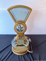 Front three-quarter view of entire scale showing dial, mechanism and platform