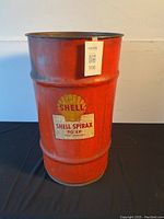 Front view of red metal drum showing Shell logo and Spirax 90 EP label.