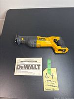 DeWalt 20V Max Cordless Reciprocating Saw laid flat showing side with model and branding