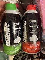 Photo showing both full-size cans of Gillette Foamy shave foam side-by-side: Regular Original (orange) and Lemon Lime (green)