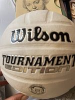 Front side of the white Wilson Tournament Edition volleyball showing clear branding and product name.