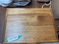 Closed wooden cutlery box with smooth light brown finish and a label LOT 494 on top.