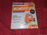 Front view of the Certified jigsaw box showing tool image, specifications, and branding.