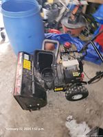 Overhead angle showing entire snowblower body, auger housing and chute