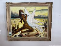 Full front view of the signed original acrylic painting in a carved gold frame, showing the figure, bird, and background landscape.