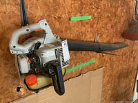 Full side view of Echo blower mounted on plywood