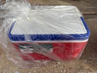 Photo of Eugene cooler wrapped in plastic to prevent dust and dirt build up.