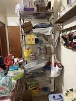 Full view of large heavy duty bakers rack loaded with various kitchen items for demonstration only. Items on shelves not included in sale.