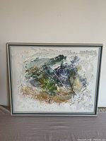 Full front view of the framed textured abstract painting on a neutral background.