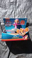 Photo of Paw Patrol Skye Helicopter toy in original packaging showing character figure and branding