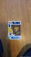 Front view of the Tinker Bell Funko Pop! figure in its box, showing the figure and box art with number 10 and Disney branding.