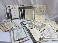 Photo showing a stack of antique religious music lyric sheets with various titles and different sizes.